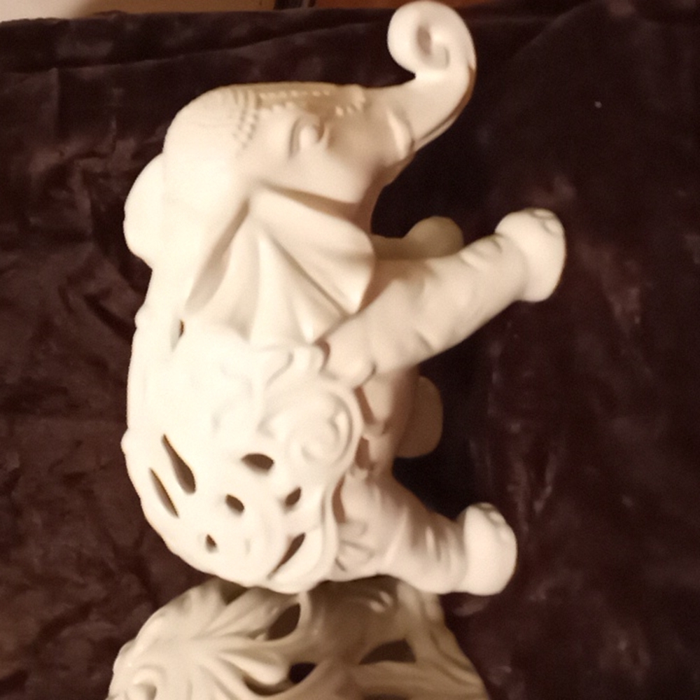 White ceramic bohemian elephants